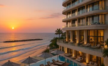The Setai Tel Aviv beachfront infinity pool with sea views at sunset